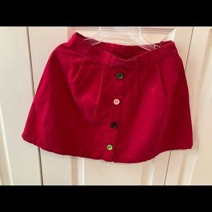 Brand New, red color, corduroy, soft material, front multicolor buttons skirt